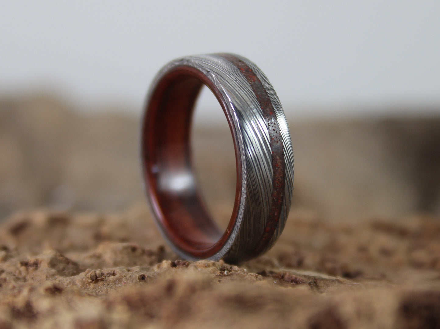 Damascus Steel Ring with Kingwood and Dinosaur Bone