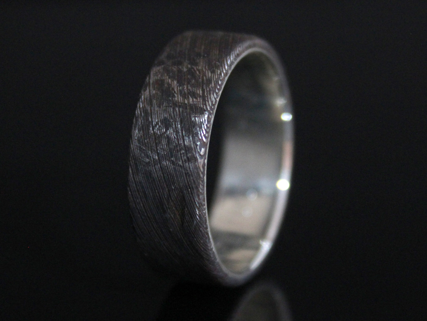War Torn Damascus Steel Ring with Silver Inside