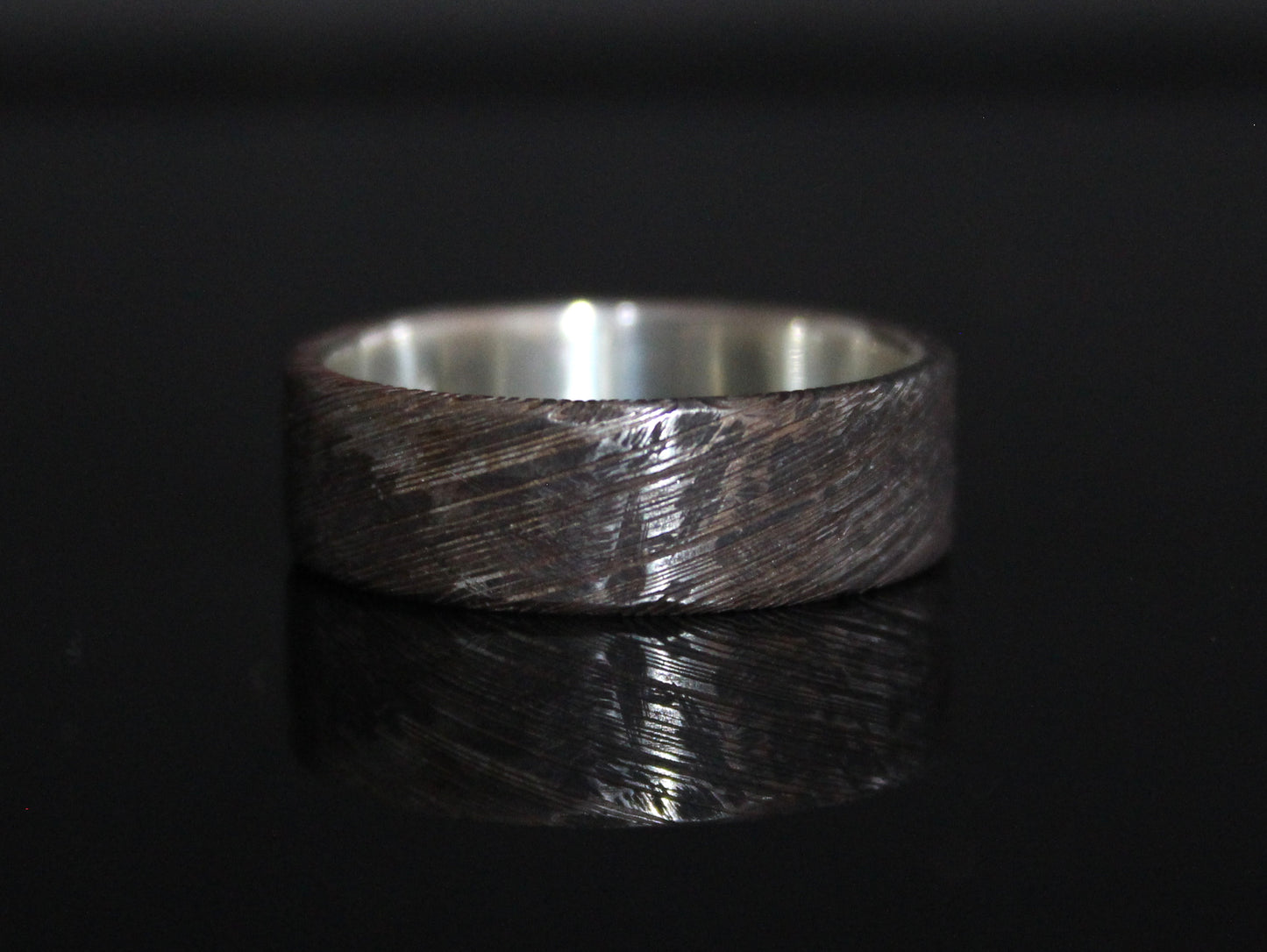 War Torn Damascus Steel Ring with Silver Inside
