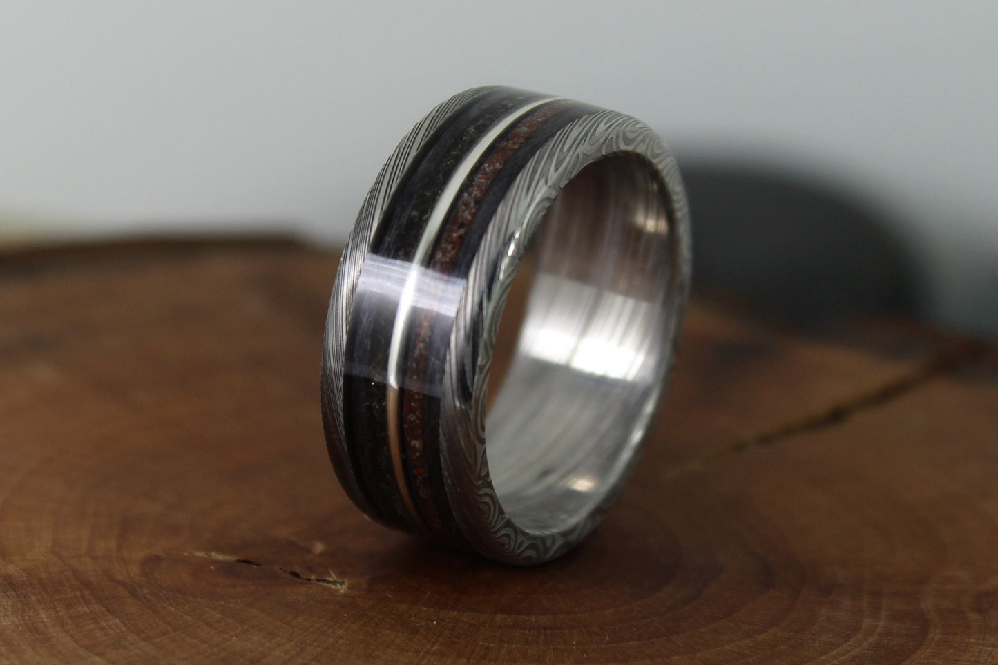 Damascus Steel Ring With Tektite Meteorite, Dinosaur Bone, Grey Maple and Silver