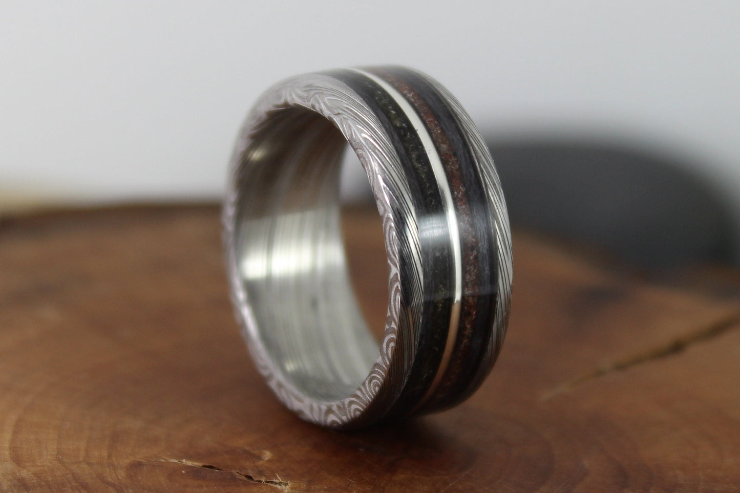 Damascus Steel Ring With Tektite Meteorite, Dinosaur Bone, Grey Maple and Silver