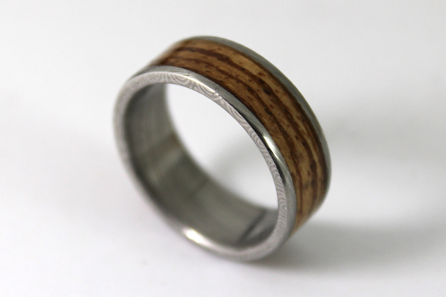 Damascus Steel Ring With Zebrano Wood Inlay