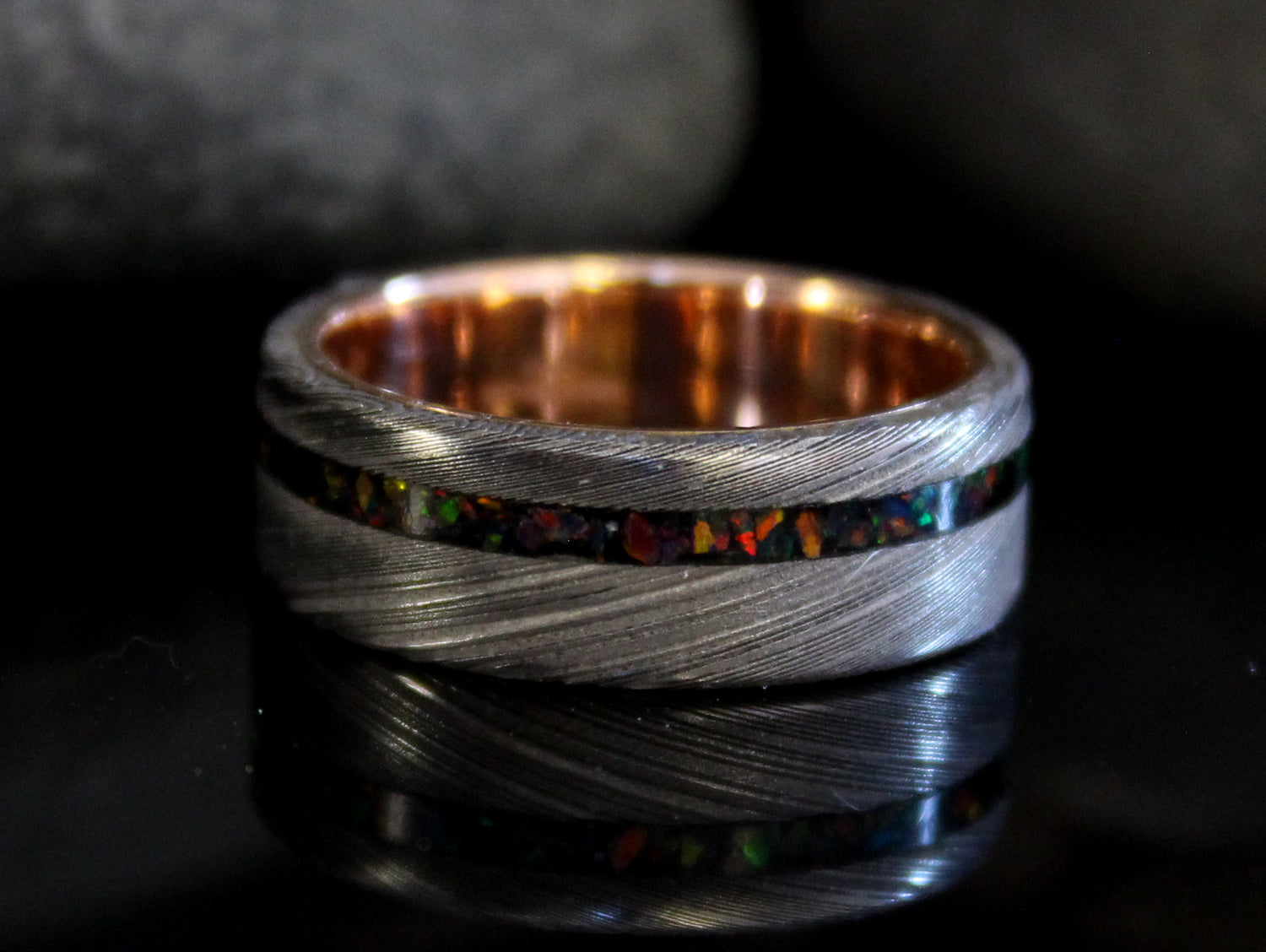 Damascus steel ring with rose gold and opal