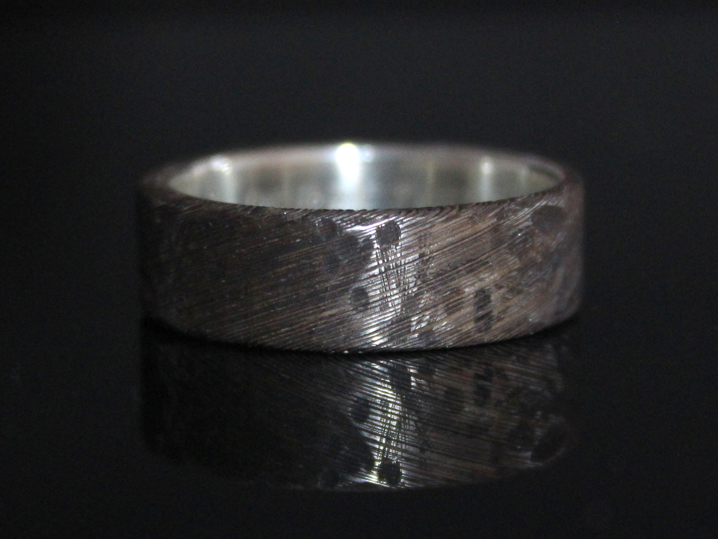 War Torn Damascus Steel Ring with Silver Inside