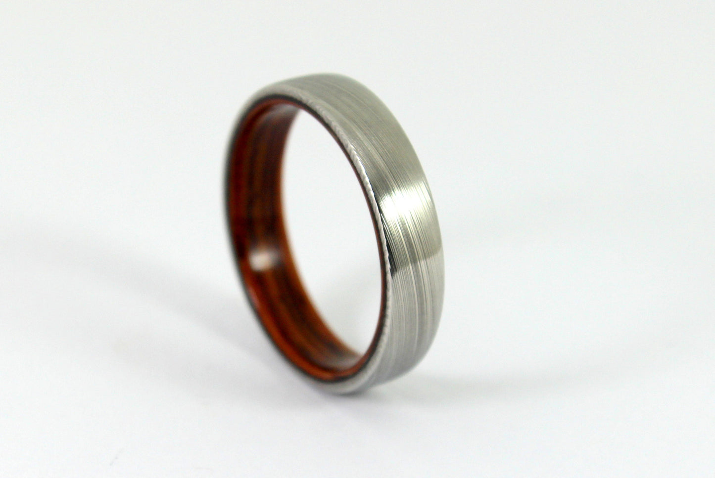 Damascus Steel Ring with Kingwood Inside